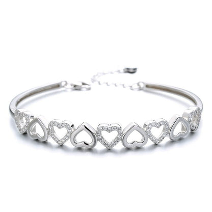 Amy and Annette 14K White Gold Hearts Bangle Adjustable Bracelet with crystals from Swarovski in 14K White Gold Plated